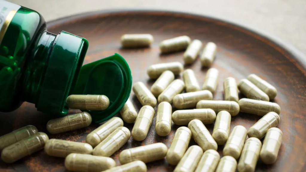 closeup green pill bottle 975647240
