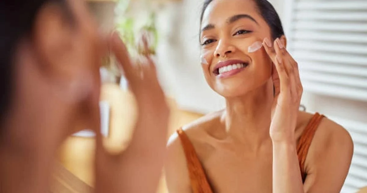 What is Ellagic Acid? Top 7 Health & Skin Benefits You Need to Know 7 Woman with radiant skin showing ellagic acid skincare benefits for hyperpigmentation