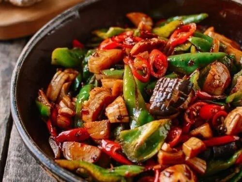 King Trumpet Mushroom Benefits: 7 Science-Backed Reasons This Fungi Deserves a Spot on Your Plate 8 Spicy king trumpet mushroom stir fry with vegetables in a wok