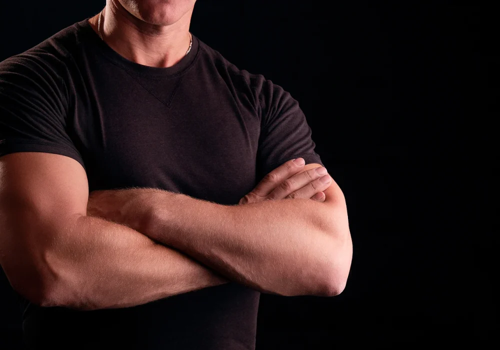 bigstock-Strong-Man-On-A-Black-Backgrou-348481882
