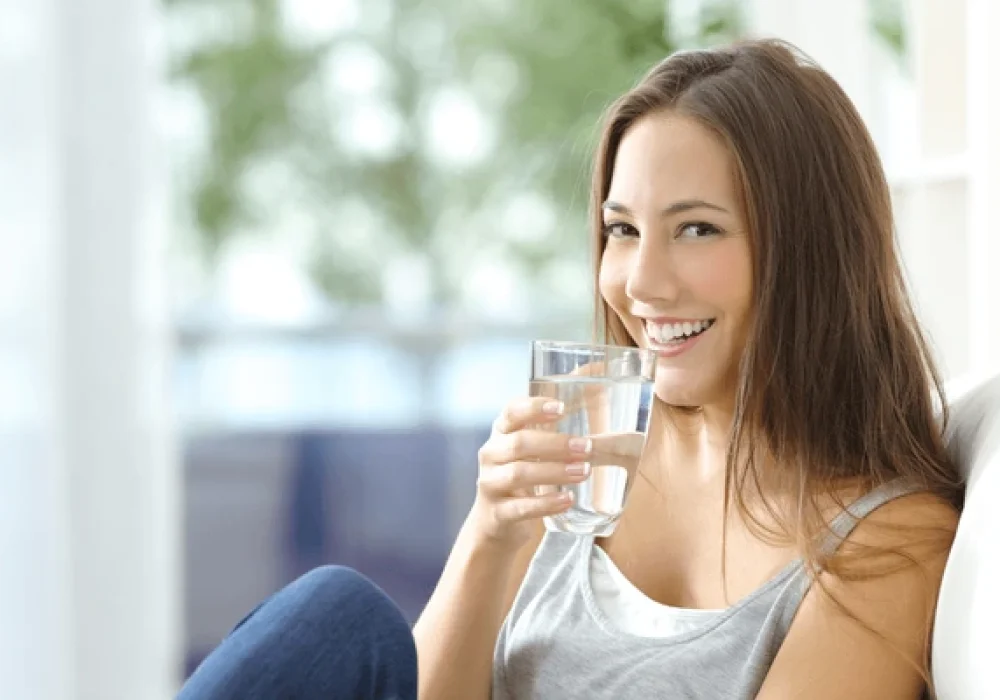 girl-drinking-water-sitting-on-600nw-324342278